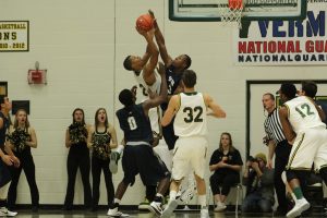 Sophomore point guard Trae Bell-Haynes is pictured in a Feb. 24 victory over the University of New Hampshire. UVM advanced to the America East championship game before falling at Stony Brook University, March 12. PHOTO COURTESY UVM ATHLETICS